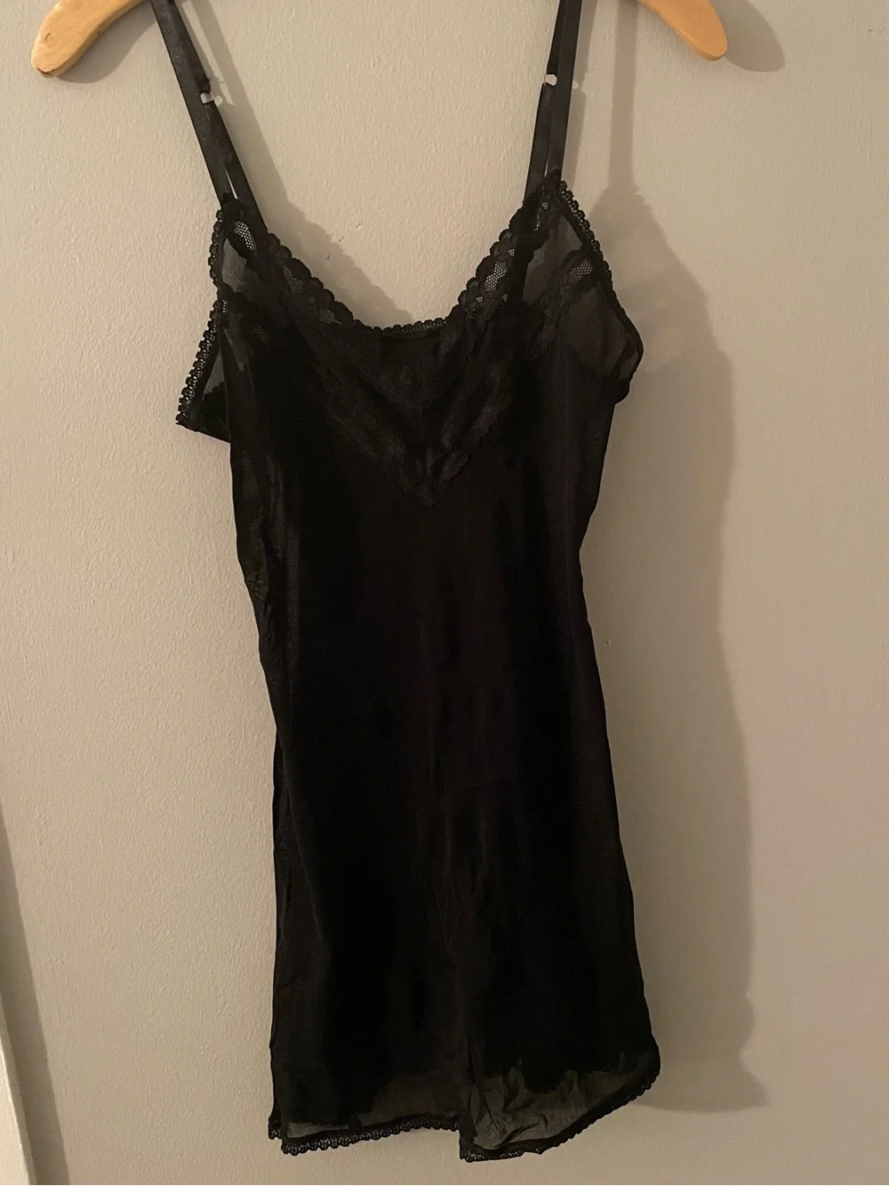 Sheer black negligeé with lace trim